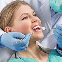 A patient undergoing a dental treatment