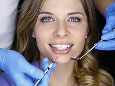 A beautiful lady having her dental procedure